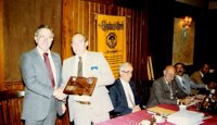With the gavel (L-R): Int Field Rep Bob Dowling & Gov Don Rake. seated are Past Gov Jim Nothers,  Pat Rehkopf, Nate Gingerich and Kerry Kirby.